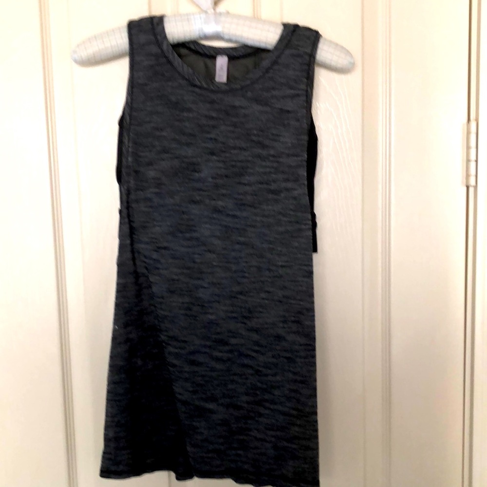 Lululemon Athletica tank top with attached crisscrossed bra. Mesh back. Size 8.